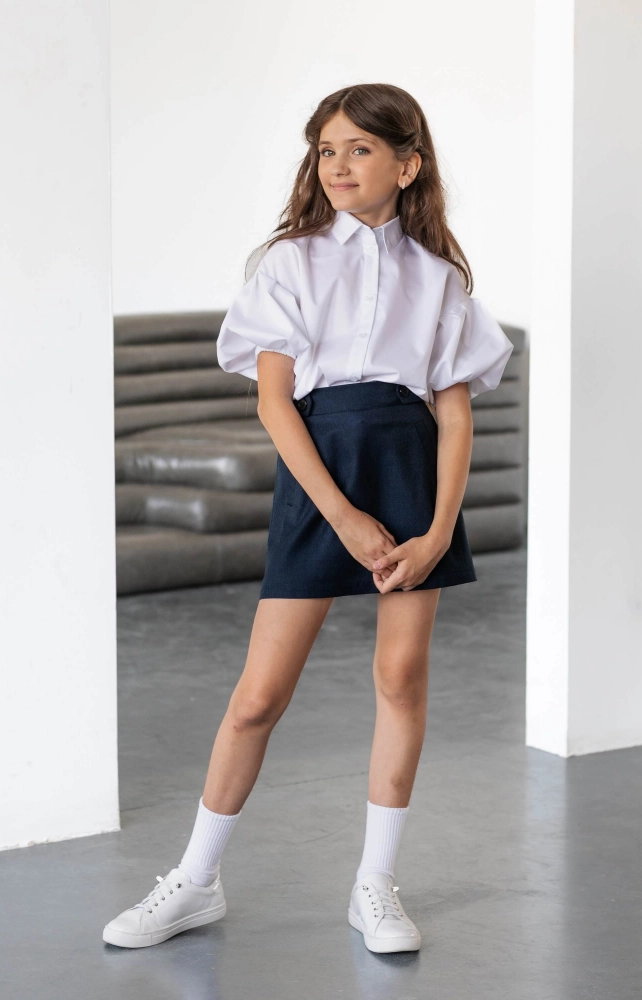 Біла блуза з рукавами-буфами