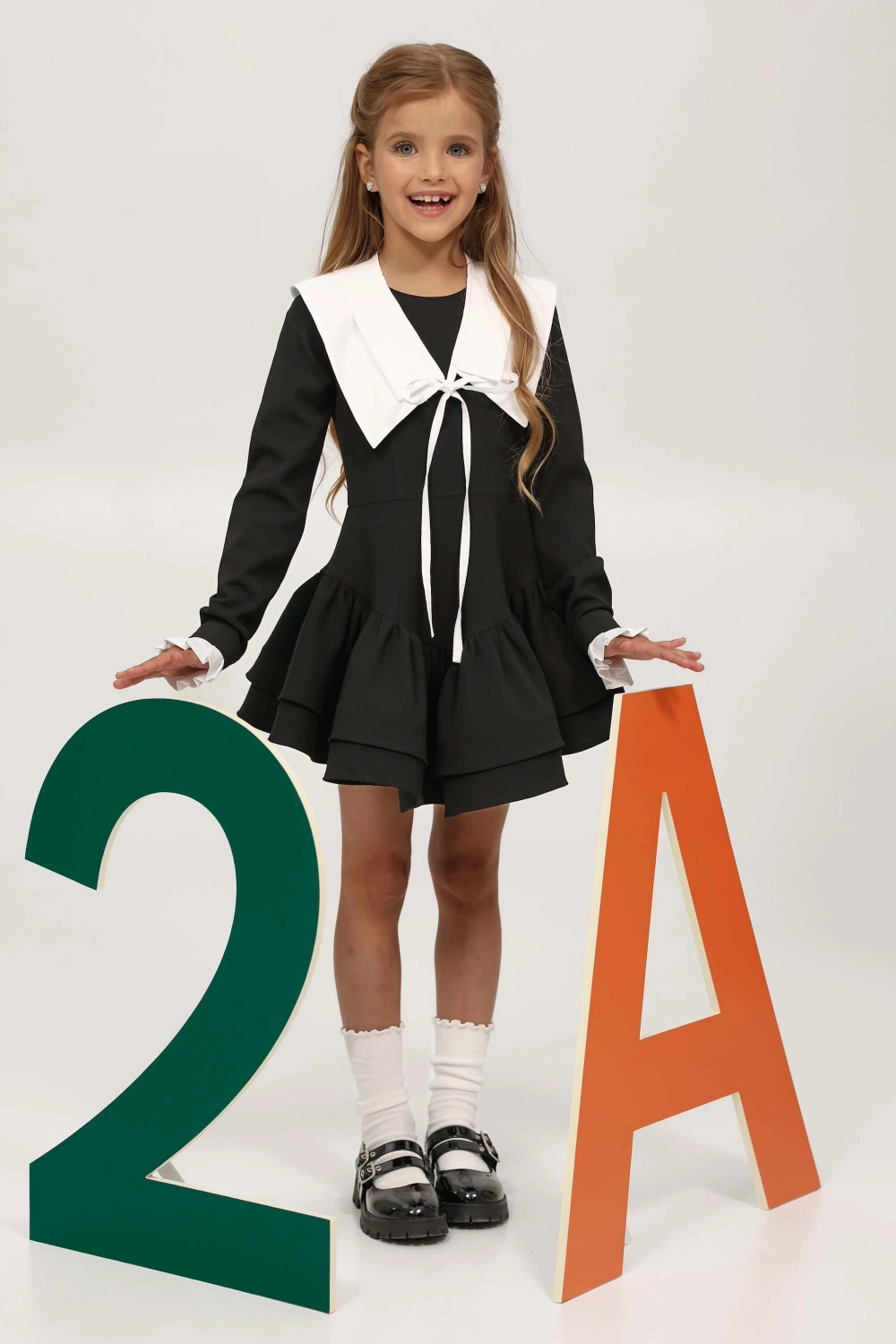 Шкільна сукня зі зйомними манжетами чорна