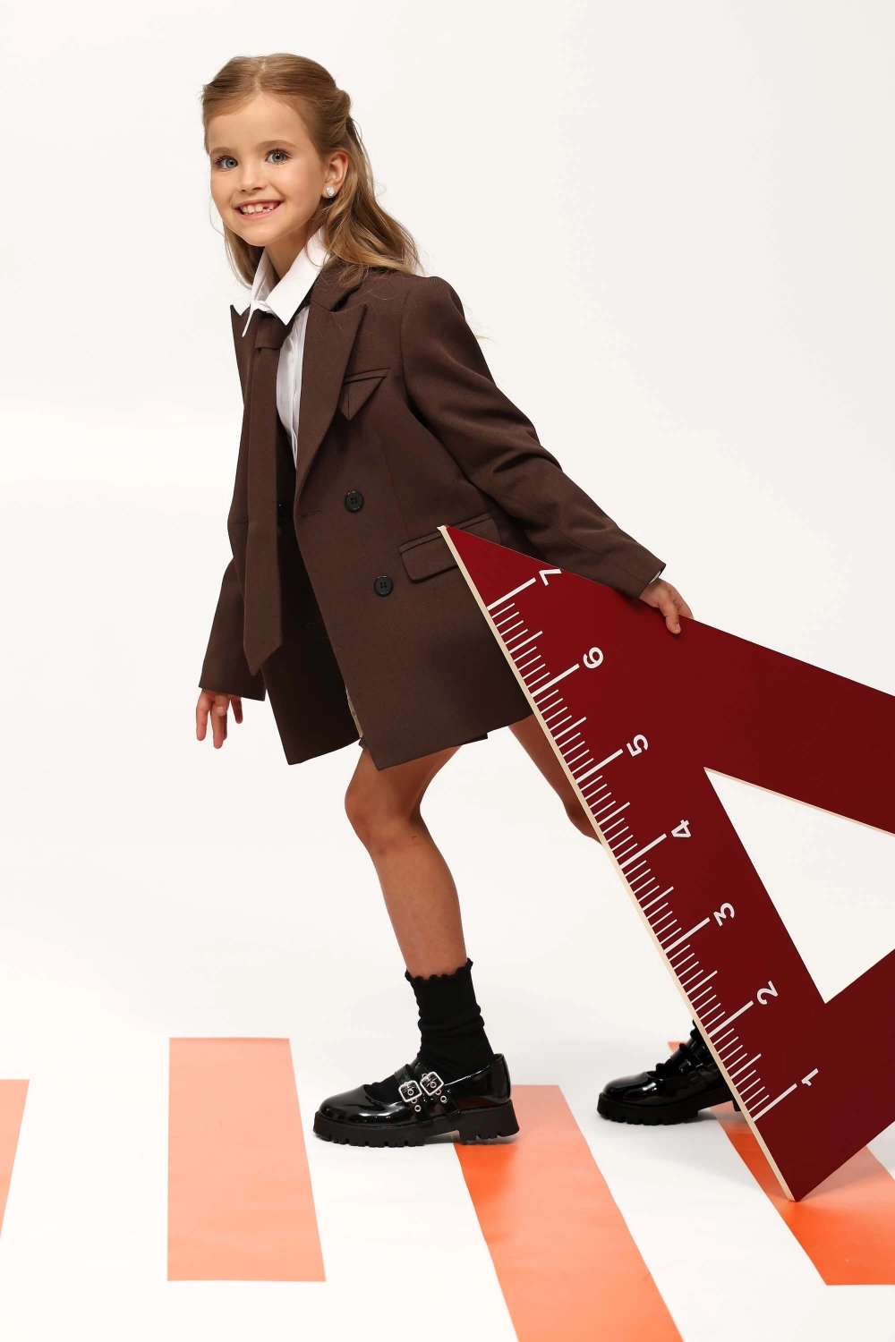 Жакет шоколадний з фактурної тканини