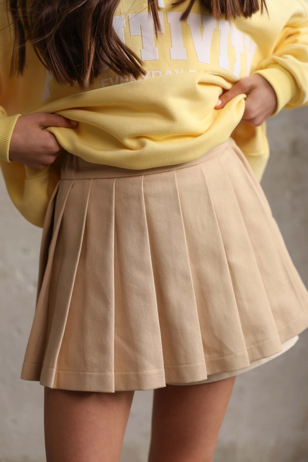 Спідниця-шорти у складку котонова бежева