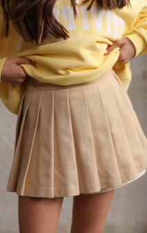Спідниця-шорти у складку котонова бежева