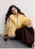 Шуба з довгого штучного хутра жовта