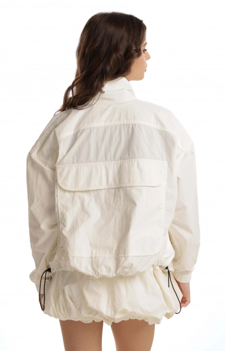 Бомбер тонкий жатий молочний